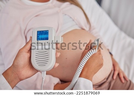 Pregnant, woman and doctor hands with heart monitor for baby healthcare, medical support or hospital gynecology. Pregnancy maternity consultation, patient stomach and gynecologist with fetal doppler
