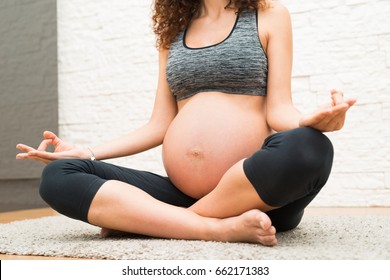 Pregnant Woman Doing Yoga