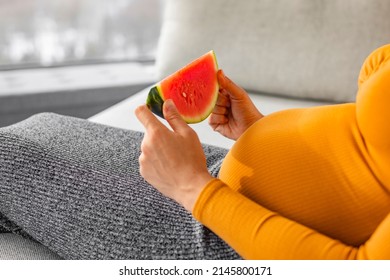 Pregnant Woman Eating Watermelon Slice During Summer Pregnancy. Sweet Fruits Craving, Gestational Diabetes Concept. Healthy Diet Nutrition