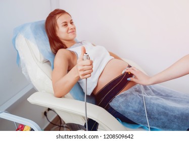 Pregnant Woman With Electrocardiograph Check Up For Her Baby. Fetal Heart Monitoring. Diagnostic, Healthcare, Medical Service