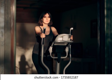 Pregnant Woman Exercising on Elliptical Machine at Home. Mother to be training on fitness apparatus
 - Powered by Shutterstock