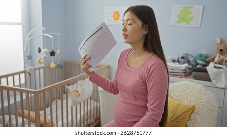 Pregnant woman fanning herself with documents in a cozy baby nursery, showcasing a serene setting with a cradle surrounded by soft toys and pastel decor.