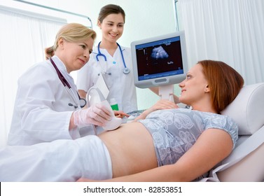 Pregnant Woman Getting Ultrasound From Doctor