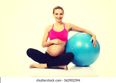 Pregnant woman with gymnastic ball