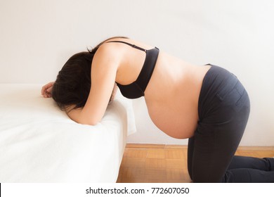 Pregnant Woman Having Contractions In Labour Pain 