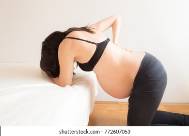 Pregnant Woman Having Contractions In Labour Pain 