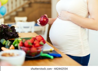 Pregnant Woman Healthy Eating Vegetables And Fruit