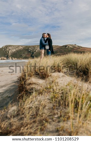 Similar – Image, Stock Photo Couple looking at the sea