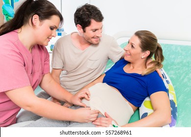 Pregnant Woman And Her Man In Delivery Room