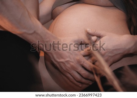 Pregnant woman man and woman hands on stomach. health pregnancy motherhood procreation concept. close-up belly of a pregnant woman. woman waiting for a newborn baby.