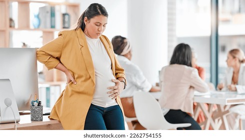 Pregnant woman, office and tired with hand on stomach, burnout and thinking by desk for wellness. Startup, corporate executive and pregnancy with stress, overworked and anxiety for health in future - Powered by Shutterstock