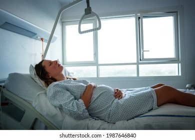 Pregnant woman in pain during labor at hospital