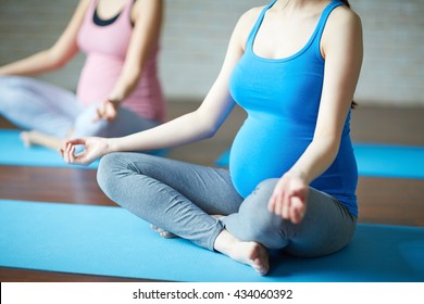 Pregnant Woman Practicing Yoga