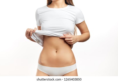 Pregnant Woman Pregnancy Concept Heart On Stomach. Hands Forming Heart On Female Belly Button. Healthy Stomach Health Concept, Or Early Pregnancy Concept With Beautiful Female Hands. Woman Model.