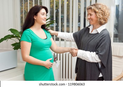 pregnant woman at prenatal psychological therapy with her therapist - Powered by Shutterstock