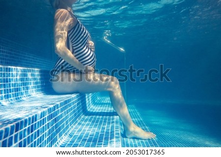 Similar – Image, Stock Photo Unrecognizable pregnant woman diving in sea