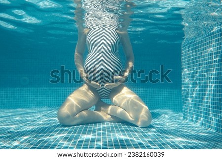 Similar – Image, Stock Photo Unrecognizable pregnant woman diving in sea