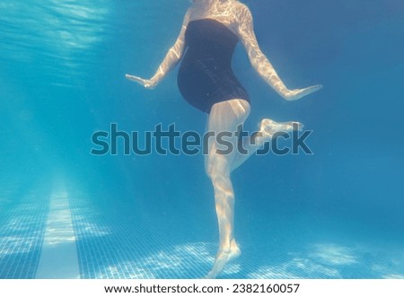 Similar – Image, Stock Photo Unrecognizable pregnant woman diving in sea