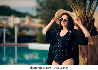 
Pregnant Woman Relaxing on Vacation By The Pool. Fashionable mother to be resting on tropical holiday
 - Powered by Shutterstock