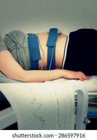 Pregnant Woman Resting While Ctg Monitor Recording Fetal Heart Rate