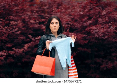 Pregnant Woman With Shopping Bags Buying Baby Stuff. Mother To Be Organizing Baby Arrival And Purchasing Newborn Item