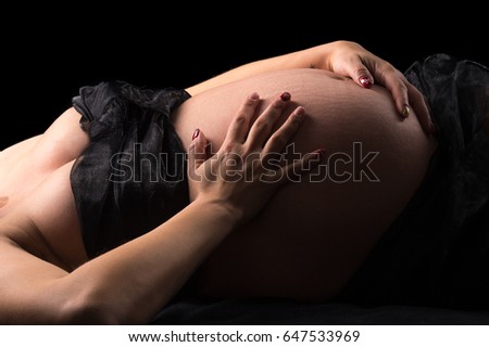 Similar – Baby sleeping on a blanket while her mother looks