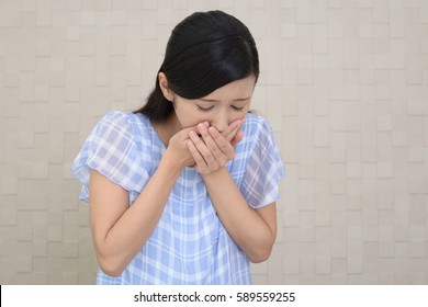 Pregnant Woman Suffering With Nausea