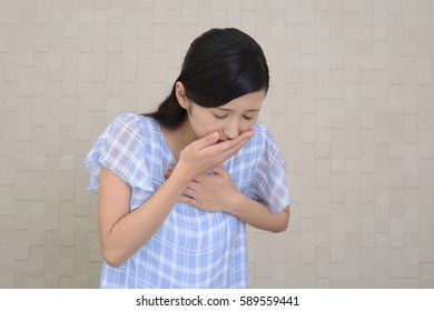 Pregnant Woman Suffering With Nausea