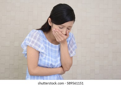 Pregnant Woman Suffering With Nausea