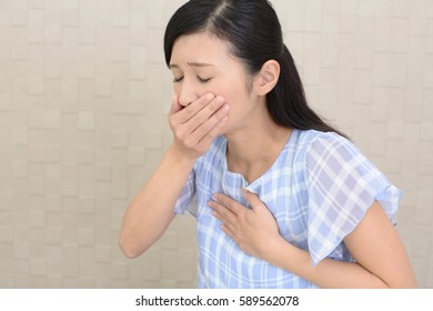 Pregnant Woman Suffering With Nausea