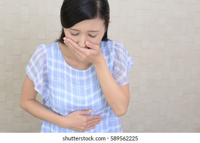 Pregnant Woman Suffering With Nausea