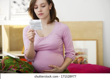 Pregnant Woman Taking Medication