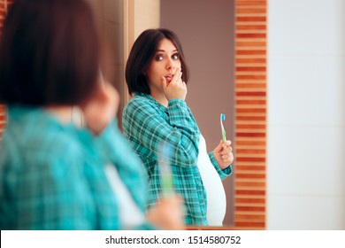 Pregnant Woman With Tooth Ache And Sore Gums. Woman Experiencing Pregnancy Difficulties In Her Last Trimester 
