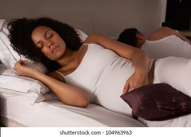 Pregnant Woman Trying To Sleep