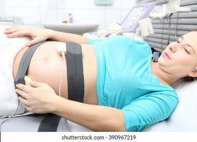 Pregnant Woman Undergoing Cardiotocography. Antenatal Care.