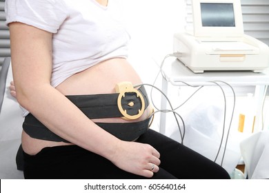 Pregnant Woman Undergoing Cardiotocography. Antenatal Care.