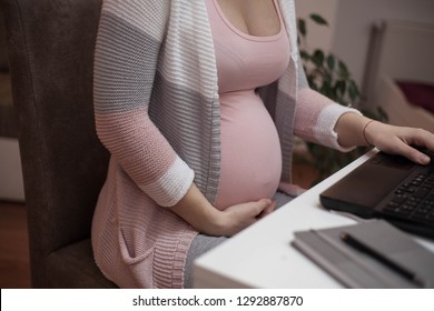 Pregnant Woman Using Laptop.