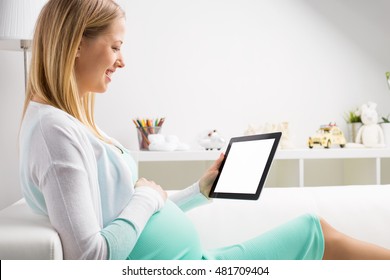 Pregnant Woman Using Tablet
