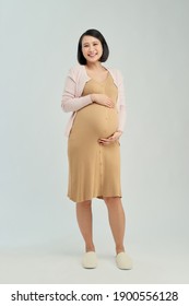 Pregnant Woman Wearing Maternity Dress