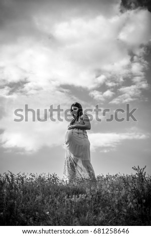 Similar – Foto Bild Rot gekleidete Frau, die im Wald meditiert.