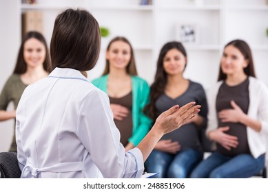 Pregnant Women Are Listening To Doctor At Antenatal Class At The Hospital