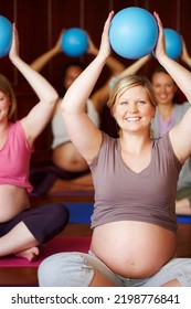 Pregnant Women, Pilates Class And Healthy Exercise With Multicultural Mothers Sitting Together In A Wellness Studio. Health, Childbirth And Pregnancy Session For Happy Women In Maternity Wear