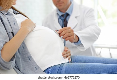 Pregnant Young Woman Visiting Doctor