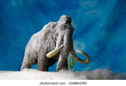 Prehistoric woolly mammoth diorama scene