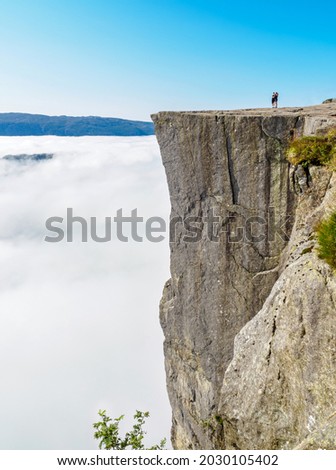 Preikestolen, the famous pulpit rock in a foggy day Norway