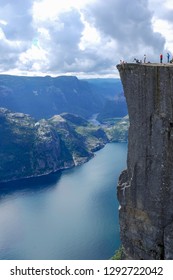 Preikestolen or Prekestolen is a famous tourist attraction in the municipality of Forsand in Rogaland county, Norway. It is a steep cliff which rises 604 metres (1,982 ft) above the Lysefjorden.  - Shutterstock ID 1292722042