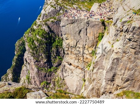 Preikestolen or Prekestolen or Pulpit Rock aerial panoramic view, Norway. Preikestolen is a steep cliff which rises above the Lysefjord.