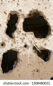 Prekaz, Kosovo – June 21, 2016: At The Adem Jashari Memorial, A Wall Shows The Signs Of The Balkan War 