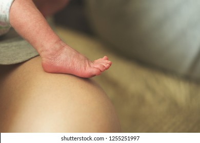 Premature Baby Leg, Foot. Baby In Incubator. A Baby Born Prematurely