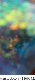 Premium abstract macro background featuring shimmering holographic particles, translucent crystal-like elements, and dreamy pastel light diffusion. This highly detailed artistic texture combines soft blue, cyan, aqua, and iridescent tones with glowing peach highlights, creating a luxurious surreal atmosphere with strong cosmic and futuristic aesthetics.

The image captures a mesmerizing composition of glittering particles, floating crystalline structures, reflective fragments, and soft-focus bokeh effects. The layered visual depth creates an ethereal, multidimensional feeling reminiscent of frozen galaxies, celestial dust, nebula clouds, liquid crystals, and futuristic dreamscapes. Light reflections and holographic sparkle add premium visual richness, making this background especially attractive for high-end creative projects.

Perfect for use in luxury branding, modern digital design, web design, beauty campaigns, cosmetic packaging, editorial layouts, product presentations, wallpapers, posters, motion graphics, social media visuals, and premium marketing materials. The abstract composition works beautifully for themes related to innovation, imagination, fantasy, science fiction, wellness, meditation, AI-generated aesthetics, and futuristic technology.

Its soft luminous glow and dreamy atmosphere evoke elegance, mystery, serenity, and visual sophistication. This abstract macro texture offers a unique blend of modern holographic design and organic crystal-like forms, making it highly versatile for both commercial and artistic use. Ideal for designers searching for premium abstract backgrounds with a futuristic, celestial, and luxurious visual identity.